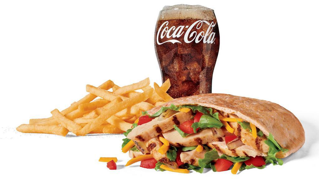 Large Chicken Fajita Pita Combo · Includes large French Fries and your choice of large drink.