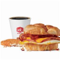 Supreme Croissant Combo · Includes hash browns and your choice of a large drink.