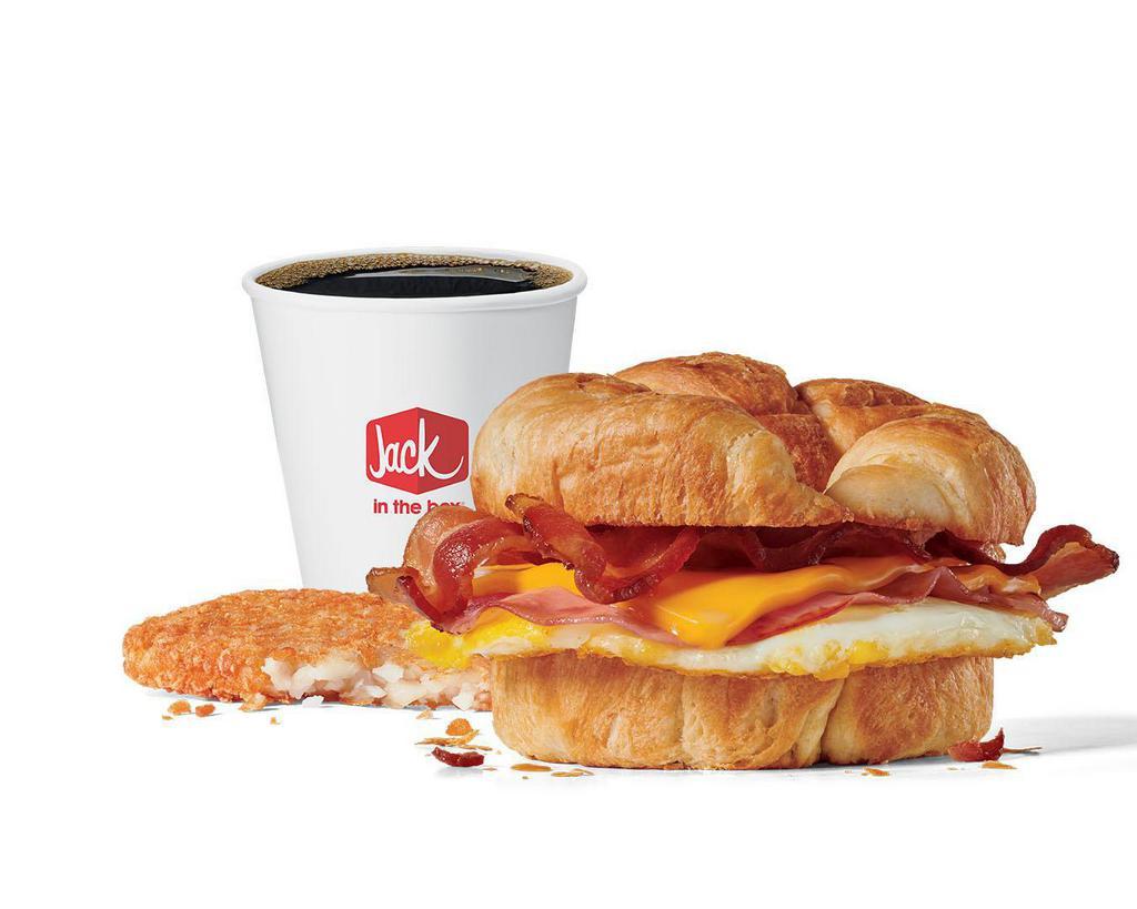 Supreme Croissant Combo · Includes hash browns and your choice of a large drink.