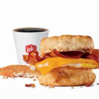 Bacon Egg & Cheese Biscuit Combo · Includes hash browns and your choice of a large drink.