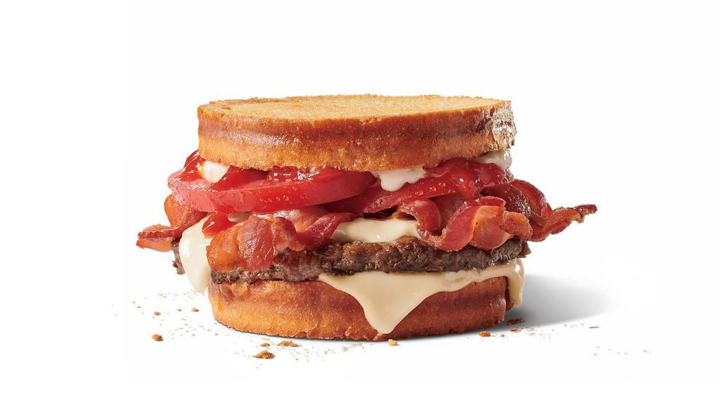 Sourdough Jack® · You claim you’re not hungry, but that’s before you read about a 100% beef patty seasoned as it’s grilled topped with hickory smoked bacon, tomato, Swiss-style cheese, real mayonnaise, and ketchup – All on a toasted sourdough bread. One more time for emphasis. Toasted. Sourdough. Bread. See? Now you’re hungry.