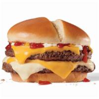Ultimate Cheeseburger™ · Can a cheeseburger change the world? Nah. Don’t be silly. But an Ultimate Cheeseburger? With...