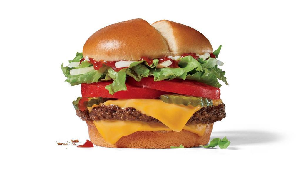 Jumbo Jack® Cheeseburger · This is the cheeseburger other cheeseburgers have posters of in their bedrooms. A 100% beef patty seasoned as it grills topped with two slices of American cheese, lettuce, tomato, pickles, chopped onions, real mayonnaise, and ketchup on a buttery bakery bun. Now, you want a poster too, huh?