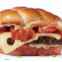 Bacon & Swiss Buttery Jack® · Sometimes, a burger comes along that makes other burgers whimper in fear. This is that burge...