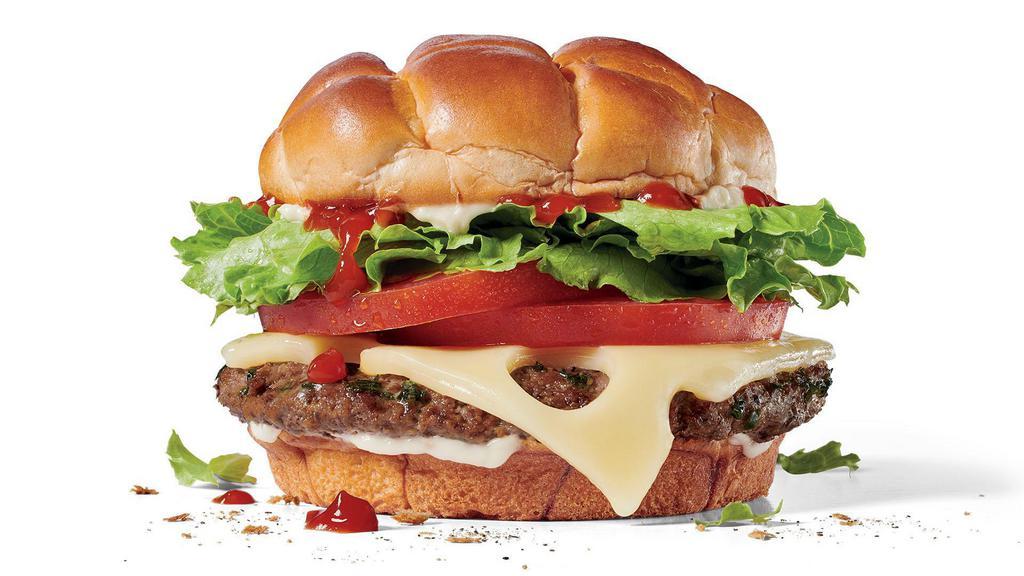 Classic Buttery Jack® W/Swiss Cheese · Melted garlic herb butter on a 100% beef patty seasoned as it grills. Need we say more? Nay. But we will anyway. Because this beautiful burger has all the fixins’ – Swiss Cheese, ketchup, mayo, iceberg lettuce and fresh sliced tomatoes, all on our buttery signature bun. Need we say more? Nay. For real, this time.