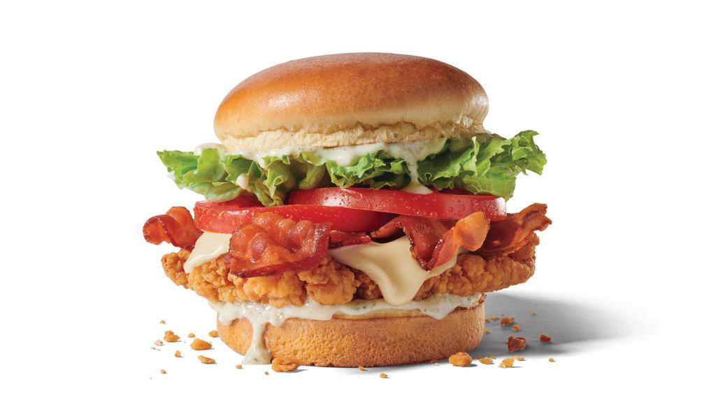 Homestyle Ranch Chicken Club · Our new crispy all-white-meat chicken that is bigger, crispier and better than ever with creamy ranch sauce, hickory-smoked bacon, lettuce, tomatoes, and cheese on a toasted Brioche bun. We call it Homestyle but feel free to eat it carstyle, officestyle, or even just Jackstyle.