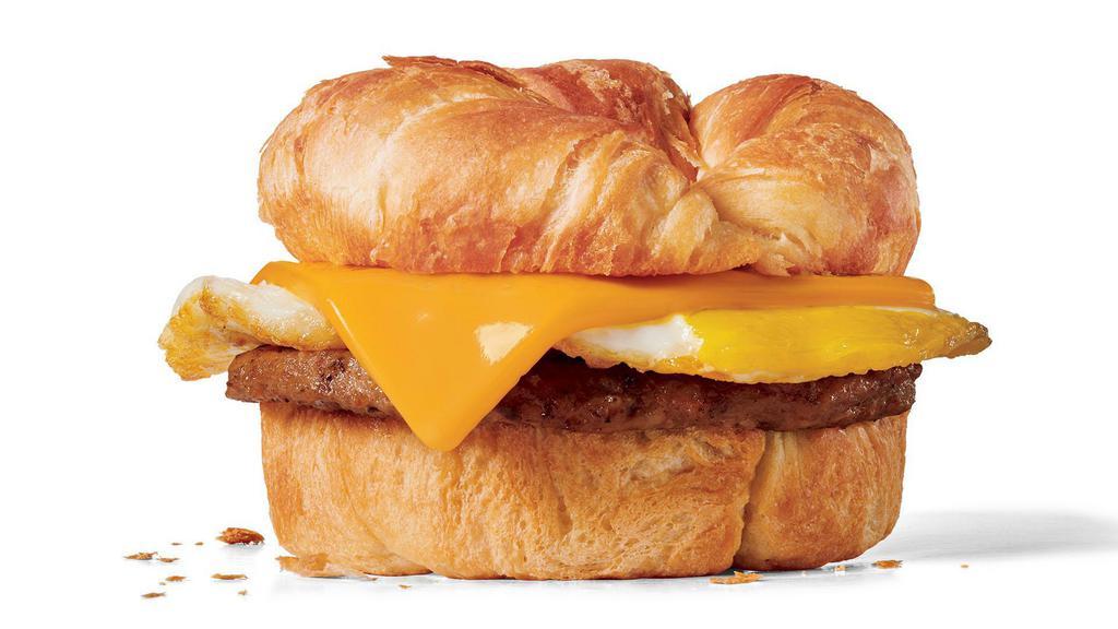 Sausage Croissant · Fried egg, sausage patty and American cheese on a toasted buttery croissant