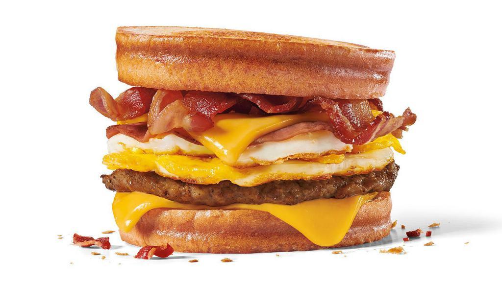 Loaded Breakfast Sandwich · Grilled Sourdough Bread loaded with 2 fried eggs, 2 slices of American cheese, bacon, ham and sausage