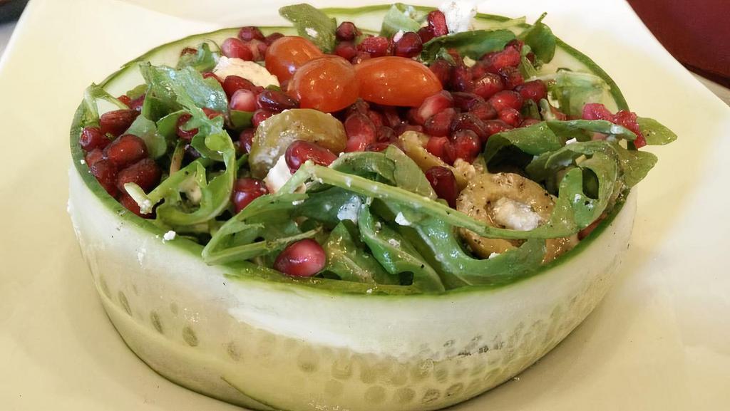Wild Arugula Salad · Arugula, cucumber, cherry tomato, green beans sprout, cranberry, olives, Goat cheese.