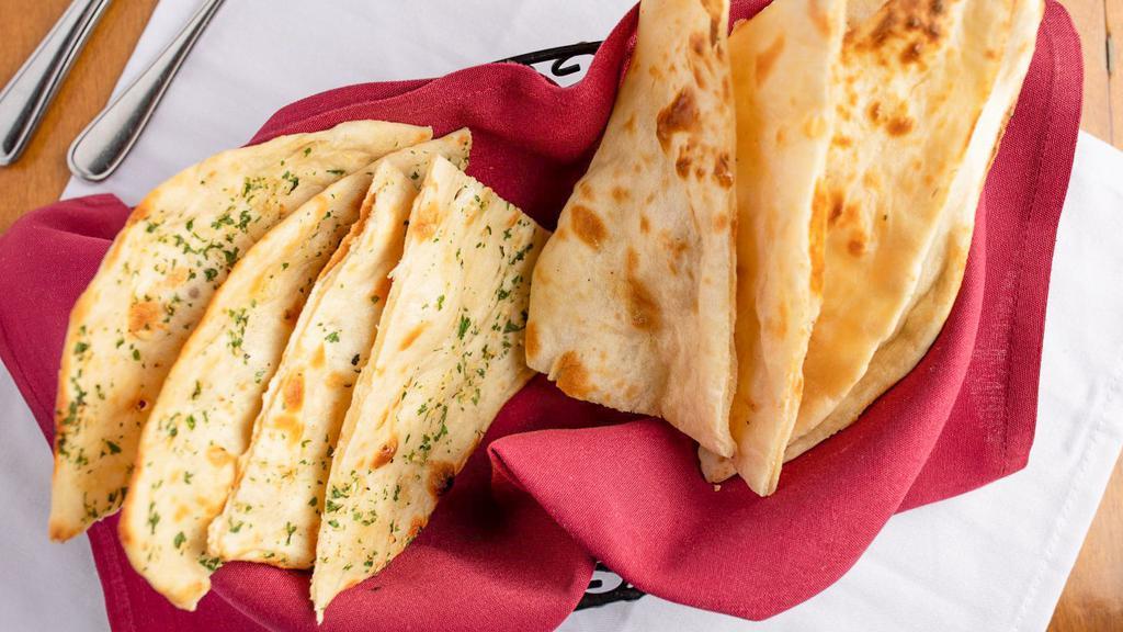 Garlic Parsley Naan  · All-purpose flour bread with garlic parsley topping.