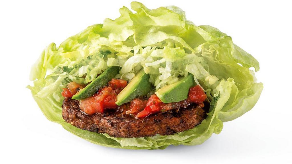 Vegan Burger · Ancient-grain-and-quinoa veggie patty with house-made salsa, fresh avocado slices and lettuce on a lettuce bun. Served with steamed broccoli.