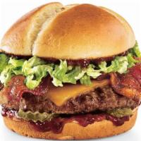 Smoke & Pepper™ · Black-peppered bacon, Cheddar, lettuce, dill pickle planks and Smoke & Pepper™ ketchup on a ...