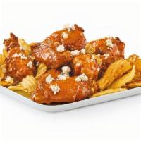 Bar Wings 'N' Yukon Chips · Bone-In Bar Wings with your choice of sauce, served on a bed of Yukon kettle chips.