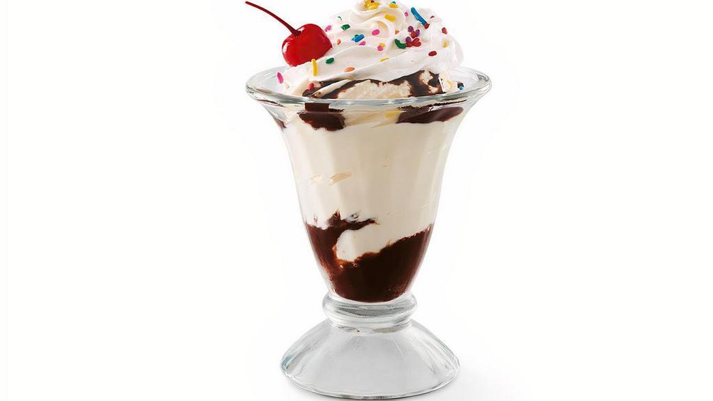 Kid'S Sundae · Two layers of Hershey’s® chocolate syrup, soft serve, whipped cream, rainbow sprinkles and a cherry on top.