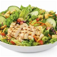 Simply Grilled Chicken · Grilled chicken breast, Cheddar, tomatoes, croutons and cucumbers on mixed greens. Served wi...