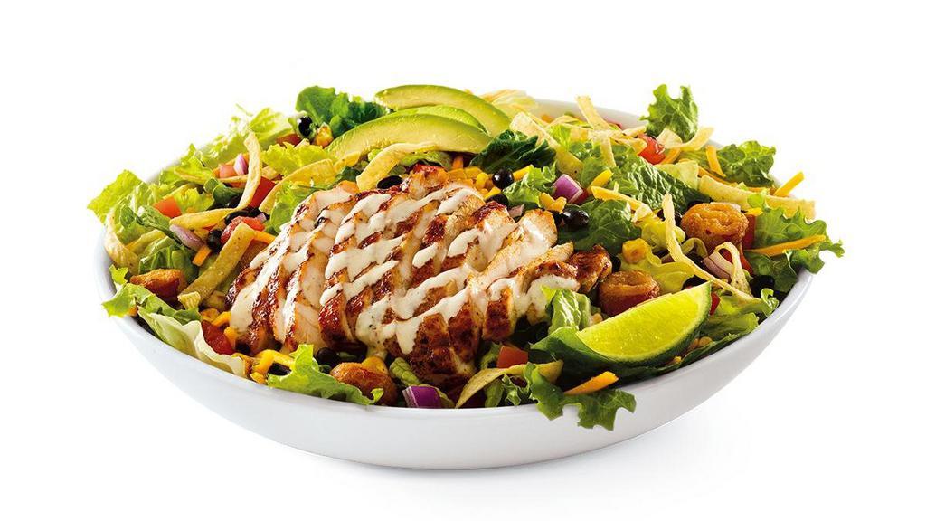 Southwest Chicken · Ancho-grilled chicken breast, black beans, avocado, fried jalapeño coins, tomatoes, diced red onions, corn, shredded Cheddar cheese, lime and tortilla strips on mixed greens. Served with salsa-ranch dressing on the side..