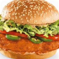 Buzzin' Chicken Sandwich · Crispy chicken breast tossed in Buzz Sauce, topped with fresh jalapeño slices, lettuce, toma...