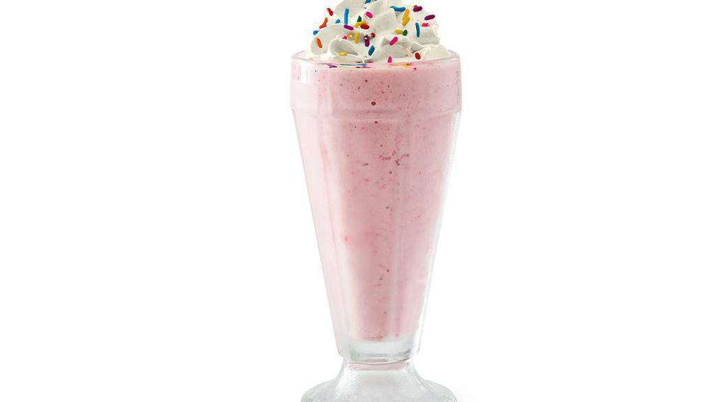 Strawberry Milkshake · Creamy soft-serve blended with milk and strawberry. Garnished with whipped cream and rainbow sprinkles.
