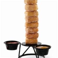 Cinnamon Sugar Towering Doh! Rings® · Eight cinnamon and sugar croissant donut rings served with caramel and fudge..