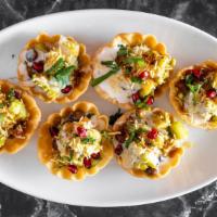 Crispy Chaat Basket · Enjoy this flour-made crispy basket filled with combination of moong sprouts, fresh-cut mix ...