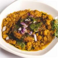 Aloo Tikki With Chole · Vegan. Deep-Fried Mashed Potato cutlets Served with chickpeas gravy, topped With Chutneys An...