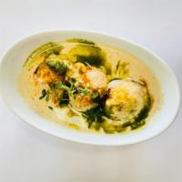 Dahi Vada/ Bhalla · Soft Fried Lentil Dumplings Topped With Chilled Yogurt, Potato, Onion, Crispy Wafers And Chu...