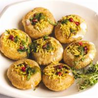 Bombay Bhel Poori · Vegan. Savory Chaat made with rice-puffs, mixed with market-fresh vegetables like onions, po...