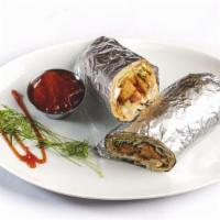 Tandoori Paneer Tikka Wrap · Clay-oven roasted Marinated Indian cottage cheese cubed with onions and bell pepper wrapped ...