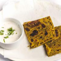 Methi Paratha · Vegan. Pan-fried Whole Wheat Bread Stuffed, With Fenugreek And Special Mixtures Of Spices.