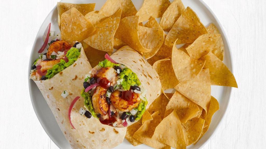 Chipotle Honey Argentinian Shrimp Burrito · Wild caught, grilled Red Argentinian Shrimp, citrus rice, black beans, handmade guacamole, cilantro/onion mix, creamy chipotle sauce, a signature chipotle honey sauce and pickled red onion all wrapped in a warm flour tortilla.  Served with tortilla chips.