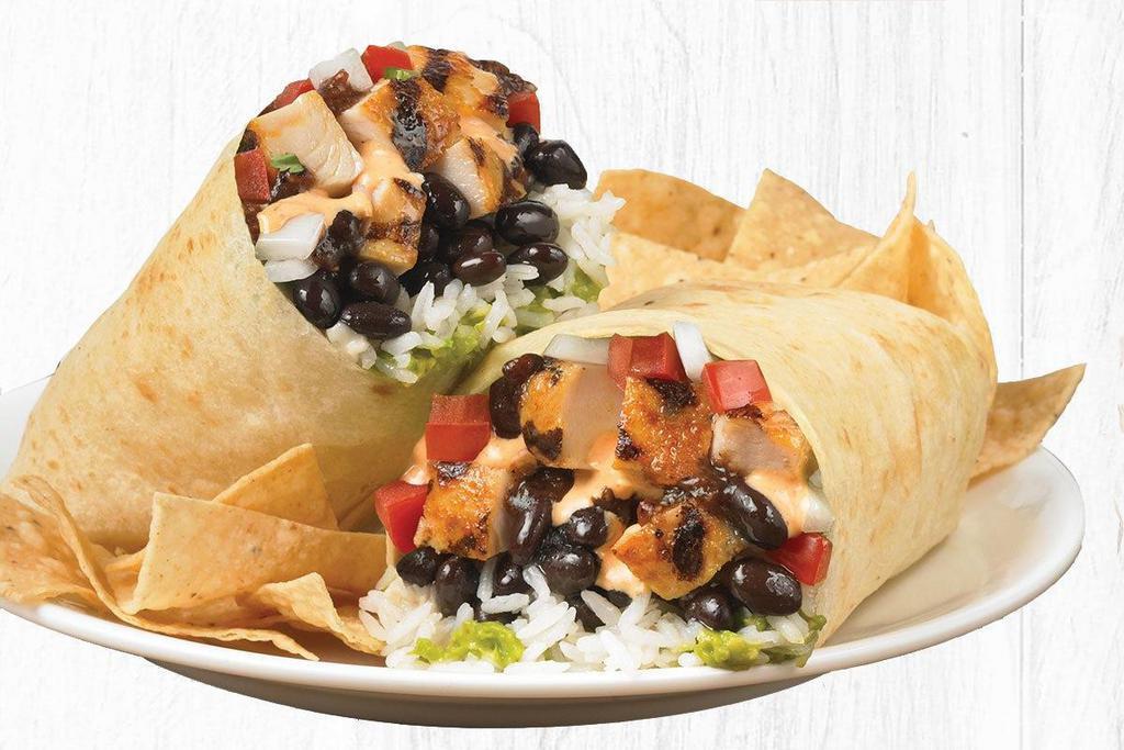 Burrito Especial With Grilled All Natural Chicken · Grilled All Natural Chicken with fresh guacamole, citrus rice, black beans, roasted chipotle salsa, salsa fresca and creamy chipotle sauce. Served with a side of tortilla chips (210 cal) or fresh greens (70 cal).