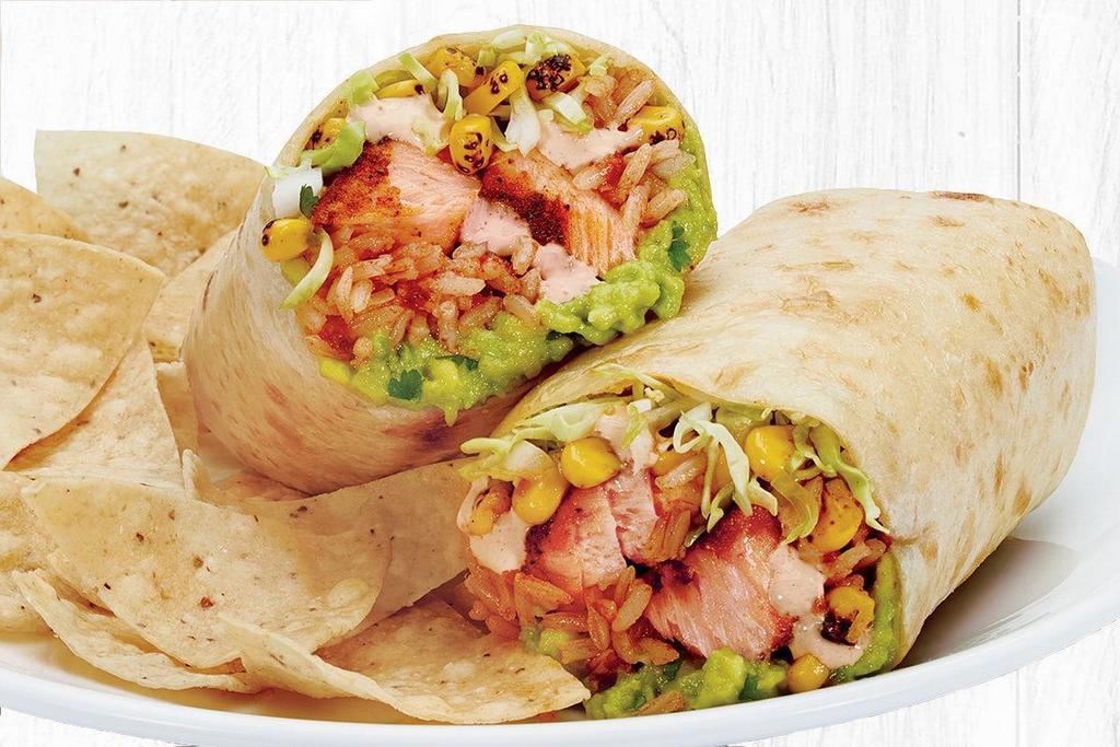 Atlantic Salmon Burrito · Sustainably-sourced Atlantic Salmon with fresh guacamole, fire-roasted corn, Mexican rice, creamy chipotle sauce, cilantro/onion mix and cabbage. Served with a side of tortilla chips (210 cal) or fresh greens (70 cal).