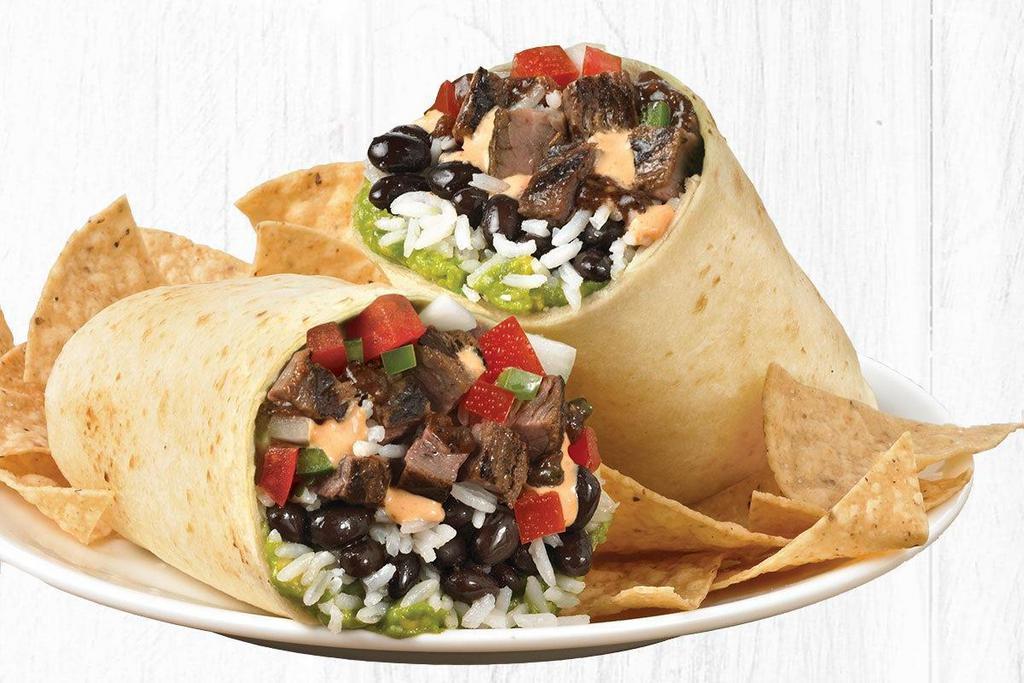 Burrito Especial With Grilled, Usda-Choice Steak · Grilled, USDA-Choice Steak with fresh guacamole, citrus rice, black beans, roasted chipotle salsa, salsa fresca and creamy chipotle sauce. Served with a side of tortilla chips (210 cal) or fresh greens (70 cal).