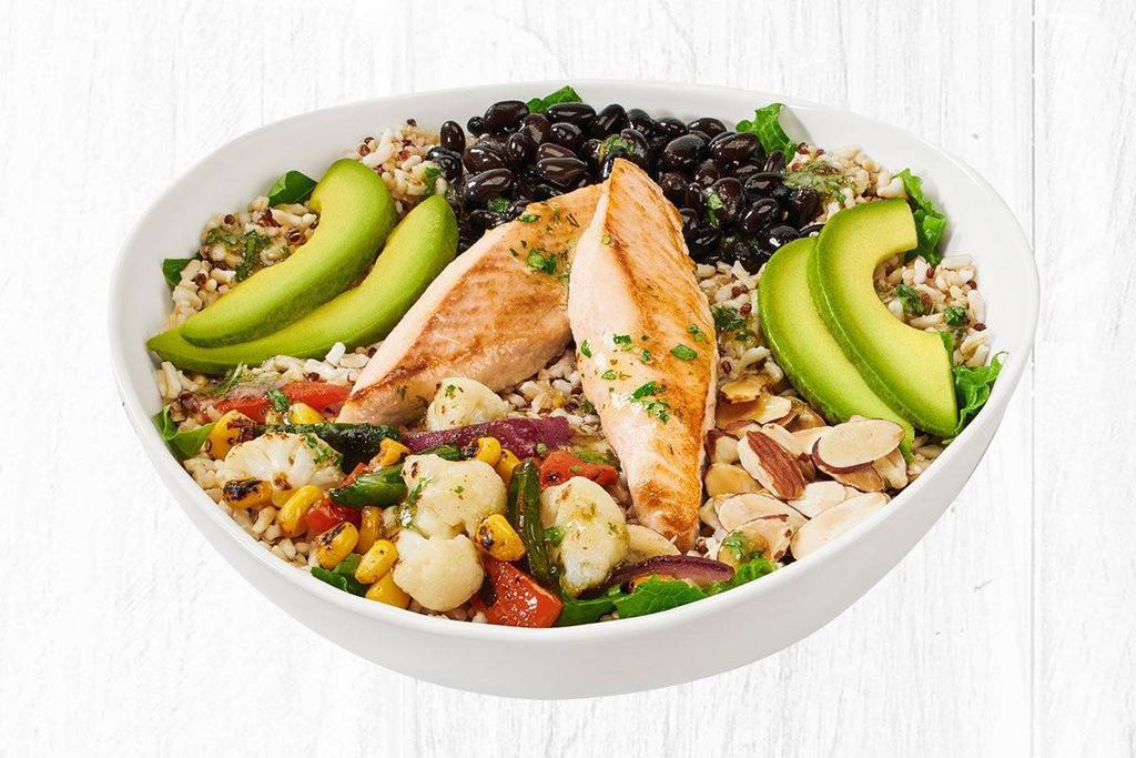 Cilantro Lime Quinoa Bowl · Choice of grilled seafood or all natural chicken served with brown rice & quinoa, romaine lettuce, cauliflower, poblanos, red bell peppers, fire-roasted corn, red onion, Hass avocado slices, black beans, cilantro lime mojo sauce and toasted almonds.. *Due to potential cross-contact when preparing menu items, it is not possible to guarantee your meal is completely free of any particular allergen or ingredient. Impossible™ meat, fish, tortillas, veggies, toasted cheese and shellfish are cooked on the same grill..