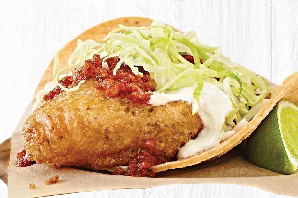 Original Fish Taco® Two Taco Plate · Wild-Caught signature white fish, beer-battered and cooked to crispy perfection, served on corn tortillas with white sauce, mild salsa and cabbage. Served with 
