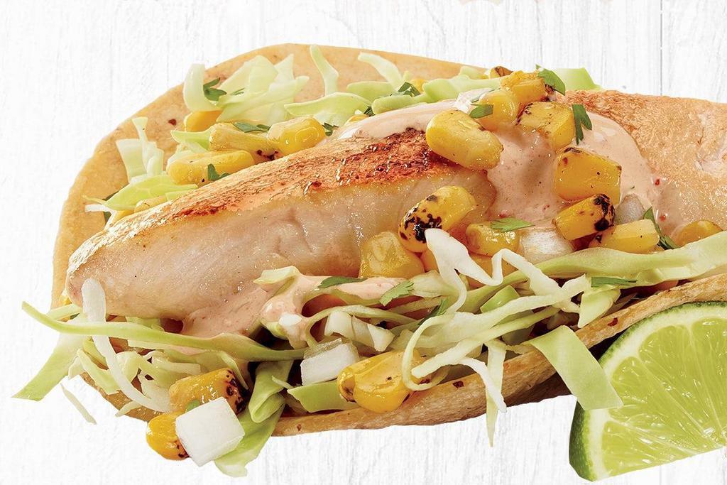 Wild-Caught Mahi Mahi Two Taco Plate · Wild-Caught Mahi Mahi served on corn tortillas with fire-roasted corn, creamy chipotle sauce, cilantro/onion mix and cabbage. Served with 