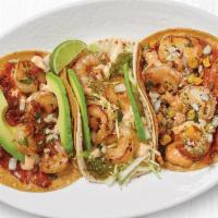 The Shrimp Trio  · Salsa Verde Shrimp Taco, Grilled Gourmet Taco™ with Shrimp, and the Wild-Caught Shrimp and M...