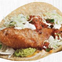 Fish Taco Especial Two Taco Plate · Wild-Caught signature white fish, beer-battered by and cooked to crispy perfection, served o...
