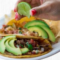 Two Taco Tasting Plate · Any two tacos with 
