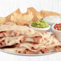 Quesadillas · Choice of cheese, pan-seared shrimp, all natural chicken or grilled USDA-Choice Steak in a t...