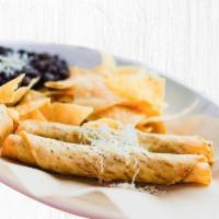 Chicken Taquitos · All natural chicken rolled in crispy corn tortillas and topped with shredded cheese. Served ...