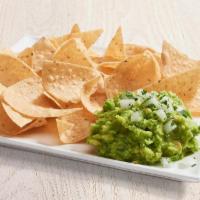 Fresh Guacamole & Chips · Made fresh daily with Hass avocados, natural sea salt, garlic and lime juice. Served with to...