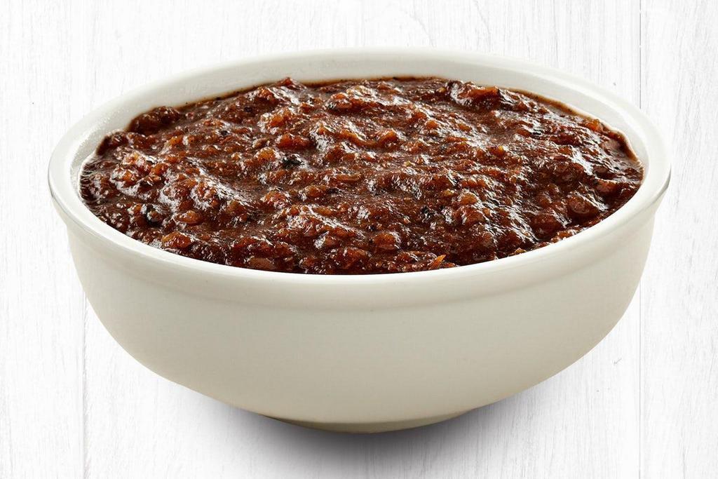 Roasted Chipotle Salsa · Fire-roasted tomatoes, smoky red and jalapeno chiles, and lime juice. (1oz)