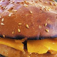 GRILLED CHEESE · For the kids! Sliced cheddar cheese on our artisanal bun - no burger patty.