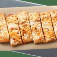 Cheesy Bread · Irresistible and packed with garlic and freshly shredded, freshly melted mozzarella and ched...