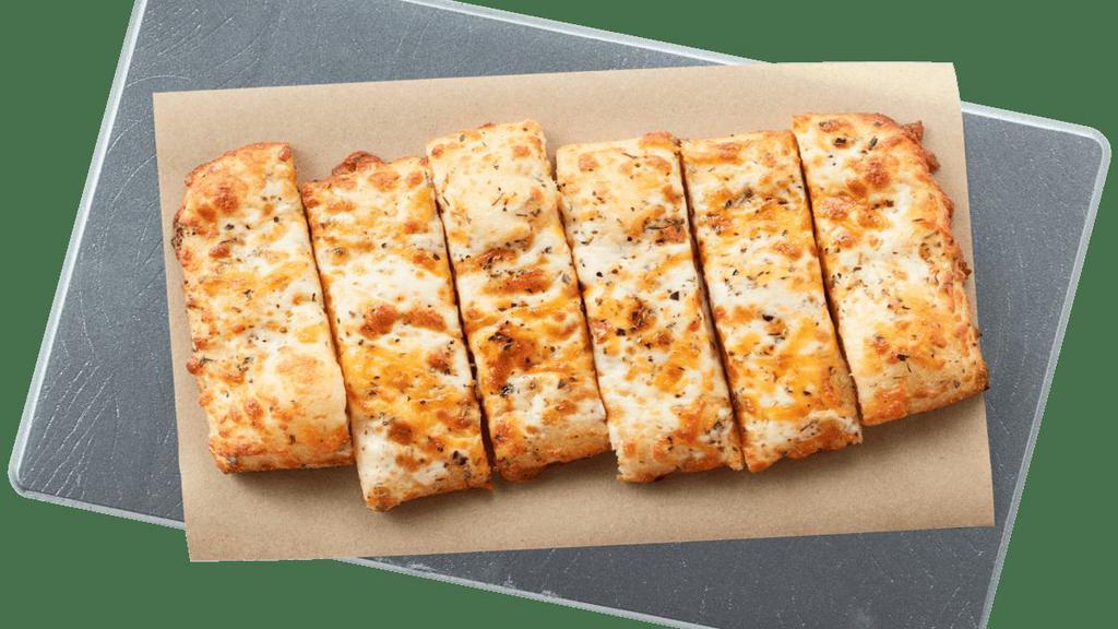 Cheesy Bread · Irresistible and packed with garlic and freshly shredded, freshly melted mozzarella and cheddar cheese. Served with pizza sauce and lite ranch dressing for dipping.