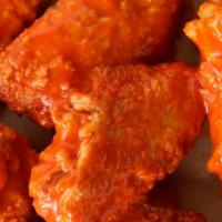 Medium Wings · Our wings are sauced with flavor! Choose from  traditional bone-in buffalo wings or oven-bak...