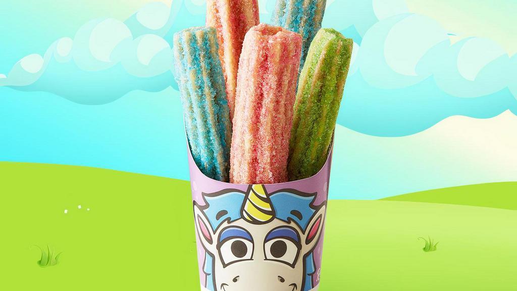 Unicorn Churros · Our churros just became magical! They are baked to perfection, and dusted with cotton candy, sour apple, and blue raspberry sugar.