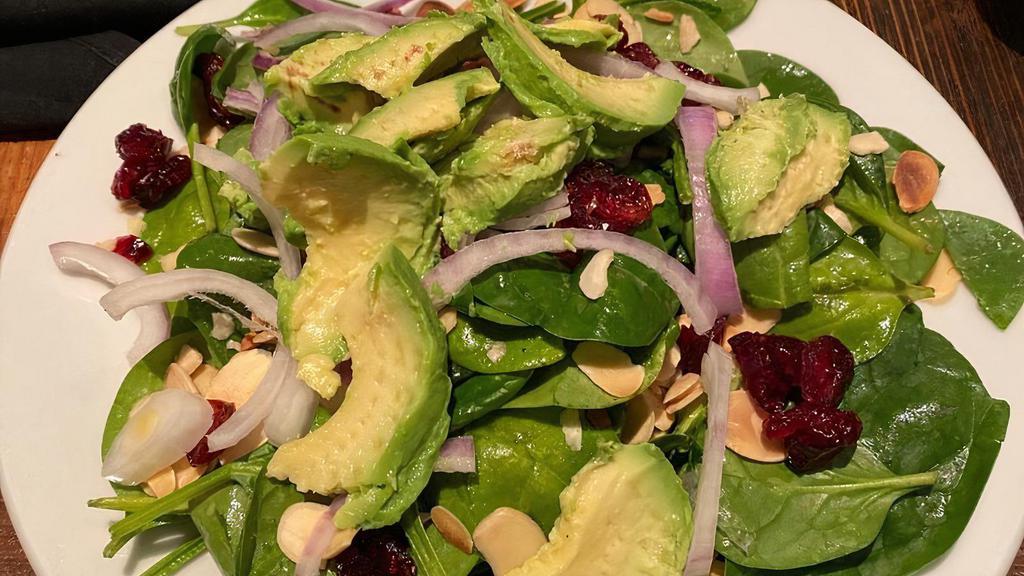 Spinach Salad · Red onion, toasted almonds, feta cheese, cranberries, avocado, citrus vinaigrette.