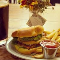 Speakeasy Burger · ½ Pound Angus burger on Kaiser roll served with chipotle aioli + organic greens. Served with...